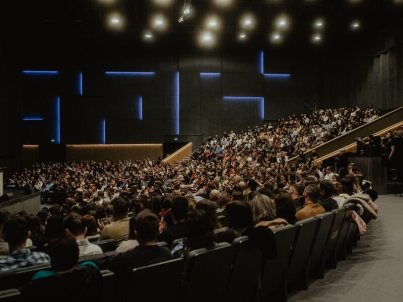 Guests gathered at an evening presentation after an event