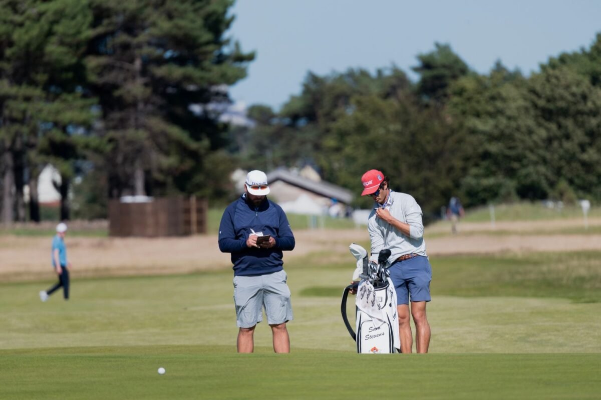 Golfers playing a Scottish course in summer