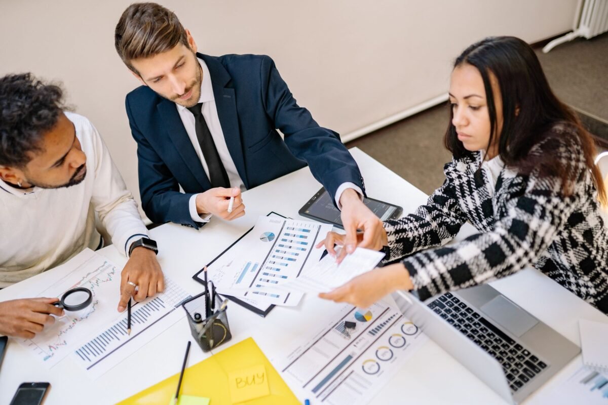 A group working through a plan in a meeting room