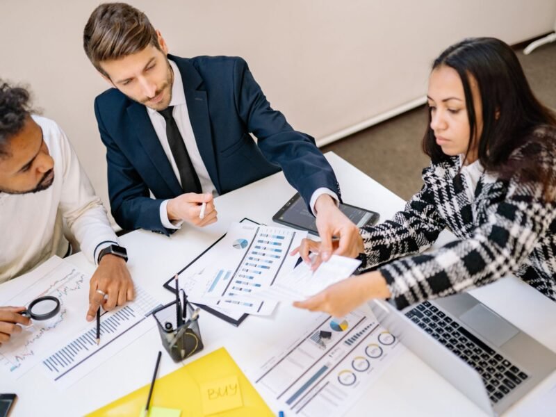 A group working through a plan in a meeting room
