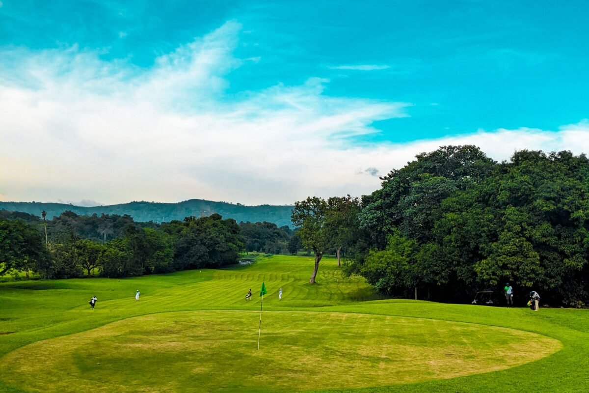 Wide sky above an open golf course