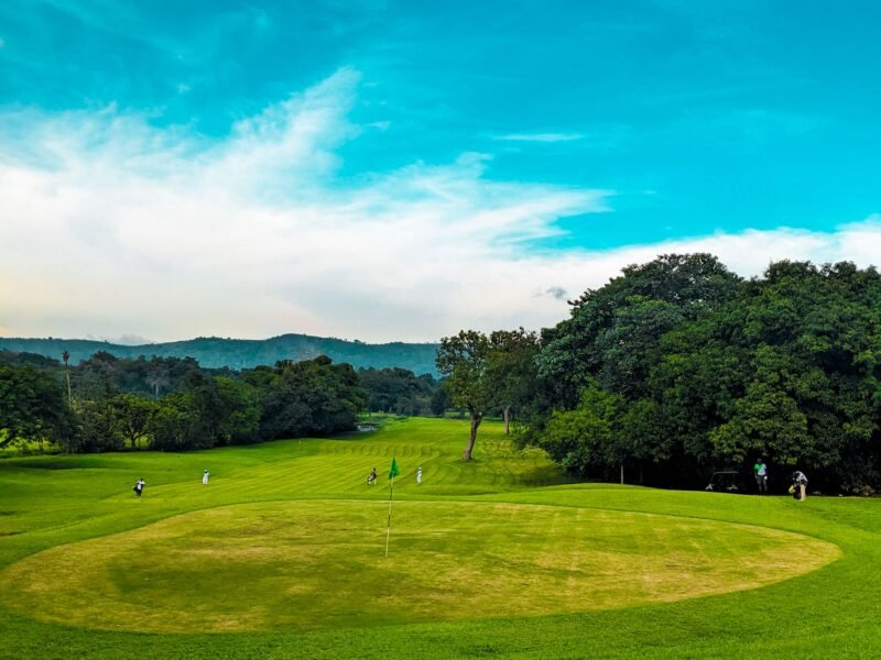 Wide sky above an open golf course