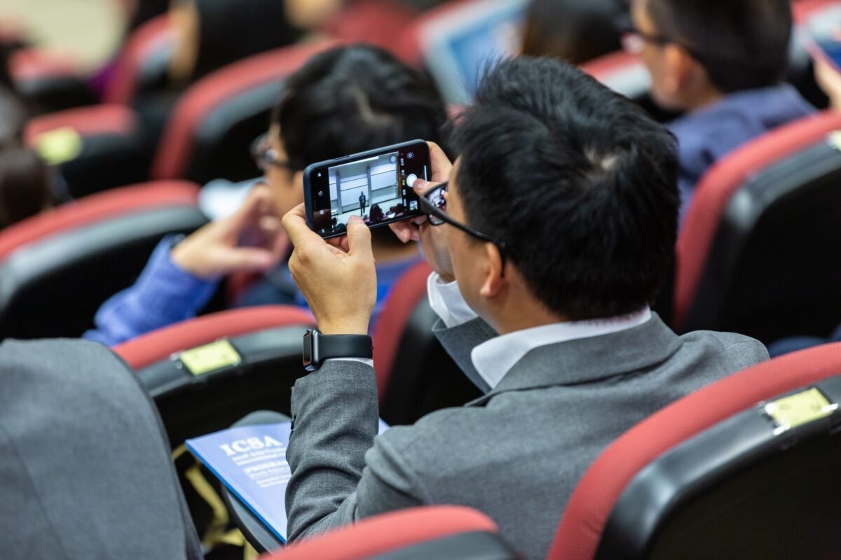 A person booking on a smartphone screen