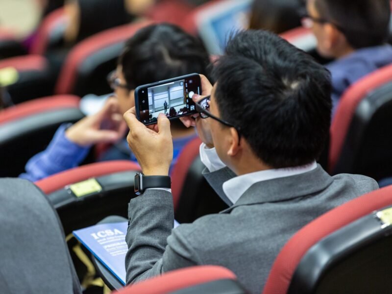 A person booking on a smartphone screen