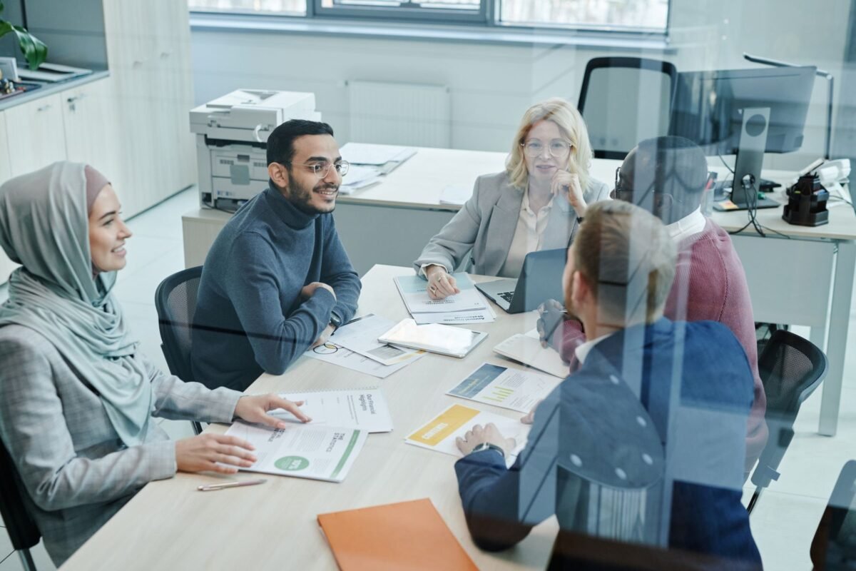 Staff in a meeting inside a conference room