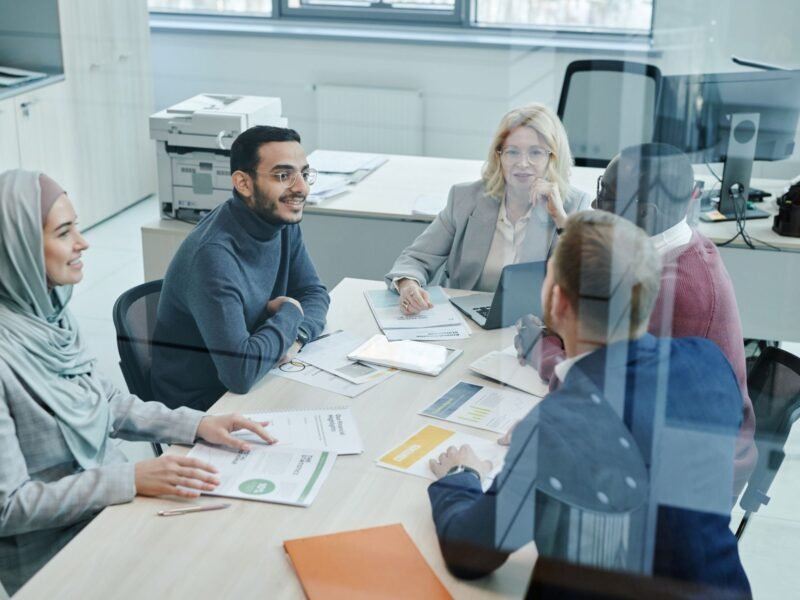 Staff in a meeting inside a conference room